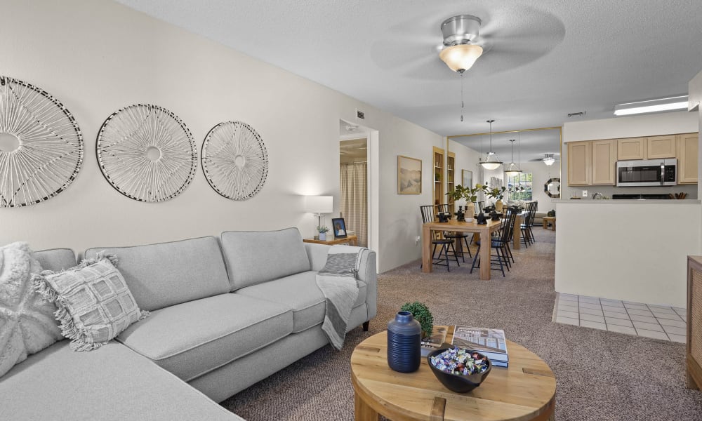 Model living room with open floor plan at The Crest Apartments in El Paso, Texas