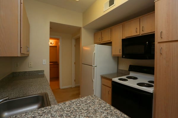 Fully equipped kitchen at Cornerstone Ranch Apartments in Katy, Texas