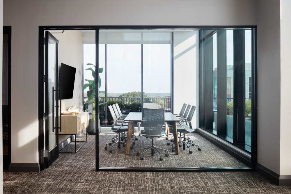 Conference room in the community lounge at The Novus Apartments in Durham, North Carolina