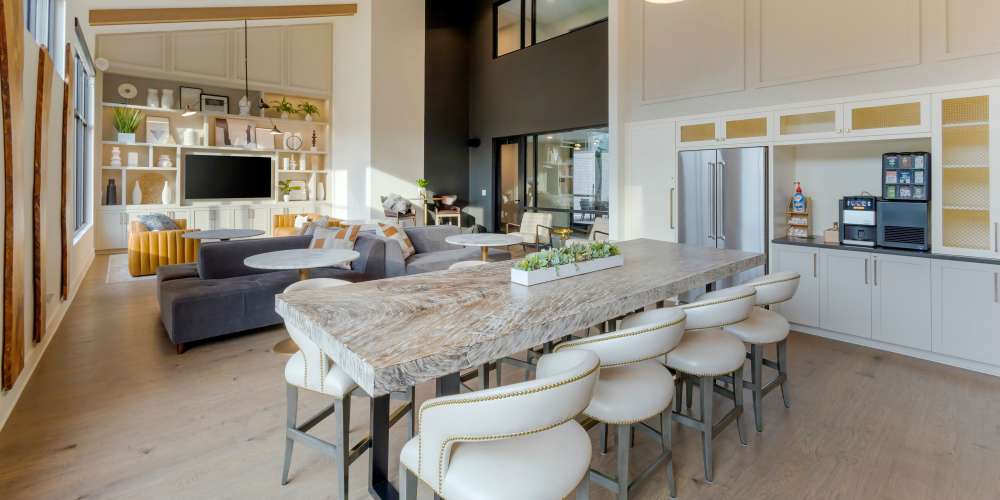 Clubhouse with breakfast bar and dining area at The Calvert in Charlotte, North Carolina