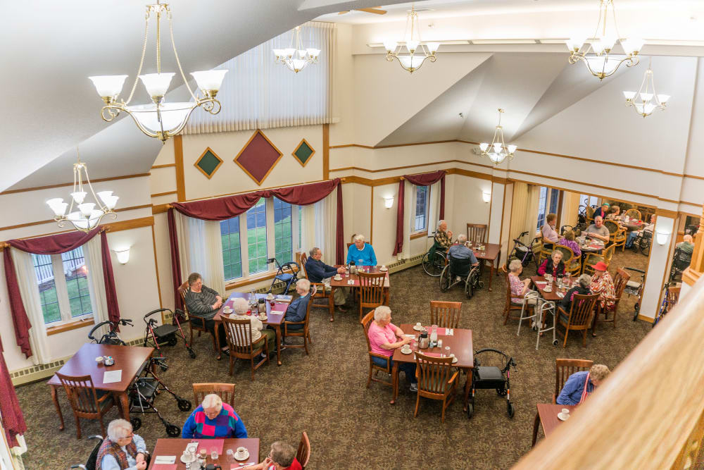 Resident dining room seen from balcony at Meadow Lakes Senior Living in Rochester, Minnesota.