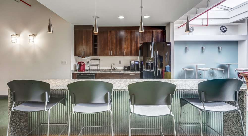 Community kitchen and dining area at Hopper Lofts in Richmond, Virginia