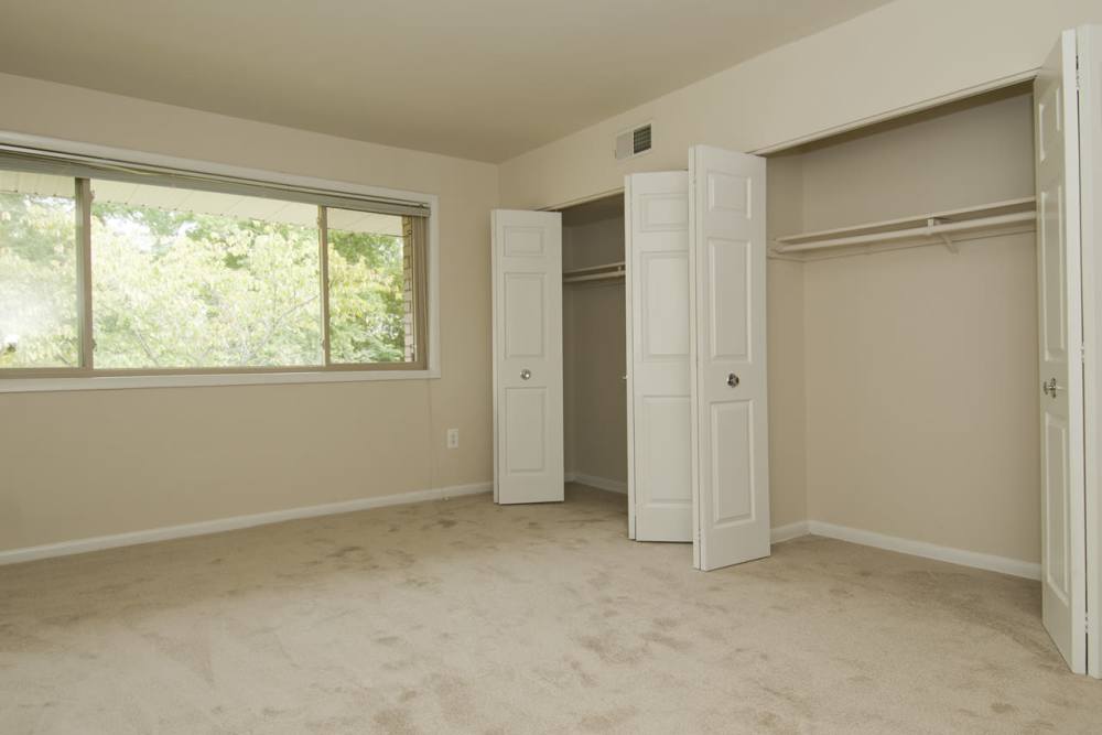 Bedroom with walk-in closets at Parke Cheverly Apartments in Hyattsville, Maryland
