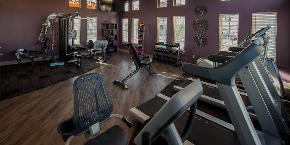 Well equipped fitness center at Watercress Apartments in Maize, Kansas