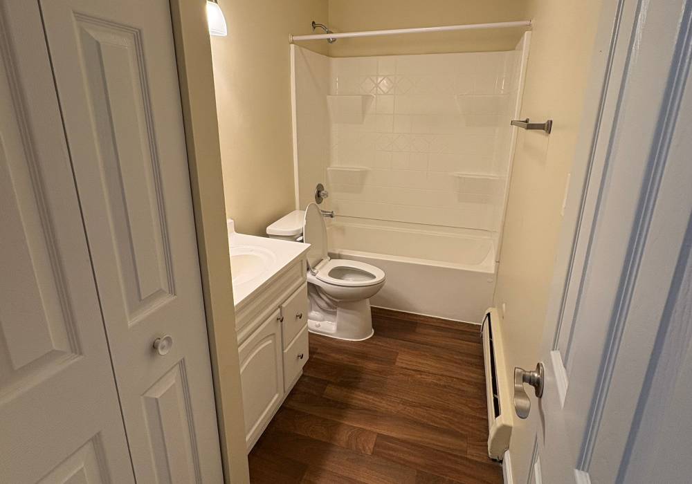 Bathroom with commode at Edgewood Group Apartments in Merrillville, Indiana