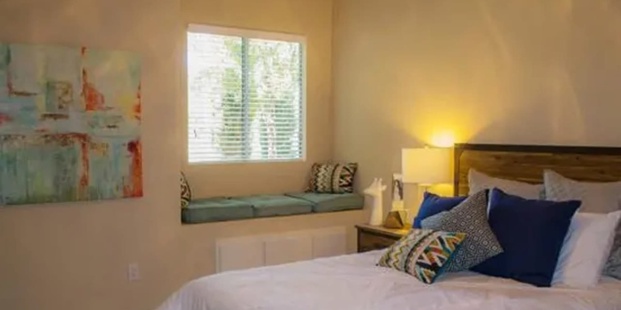 Bedroom with large window at Siena Villas Apartments in Elk Grove, California