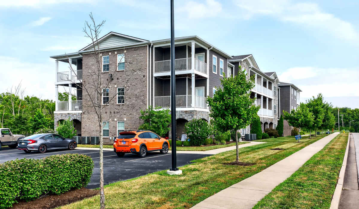 Community apartmnet with parked car at Palomar Woods in Lexington, Kentucky