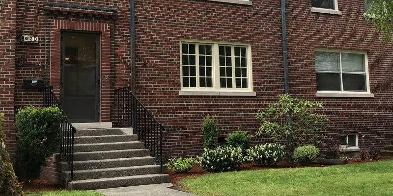 Entrance to a home with landscaping at The Bricks in Joint Base Lewis McChord, Washington