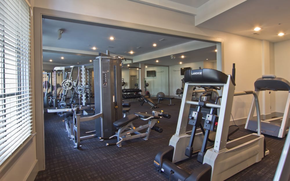 Well-equipped fitness center with cardio equipment at Easton Commons Apartments & Townhomes in Columbus, Ohio