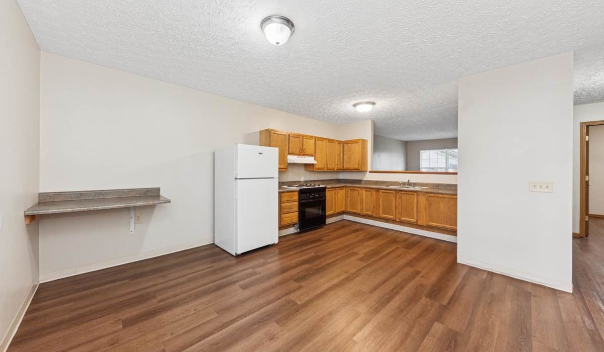 Kitchen with wood flooring at Webster Glen in Peebles, Ohio