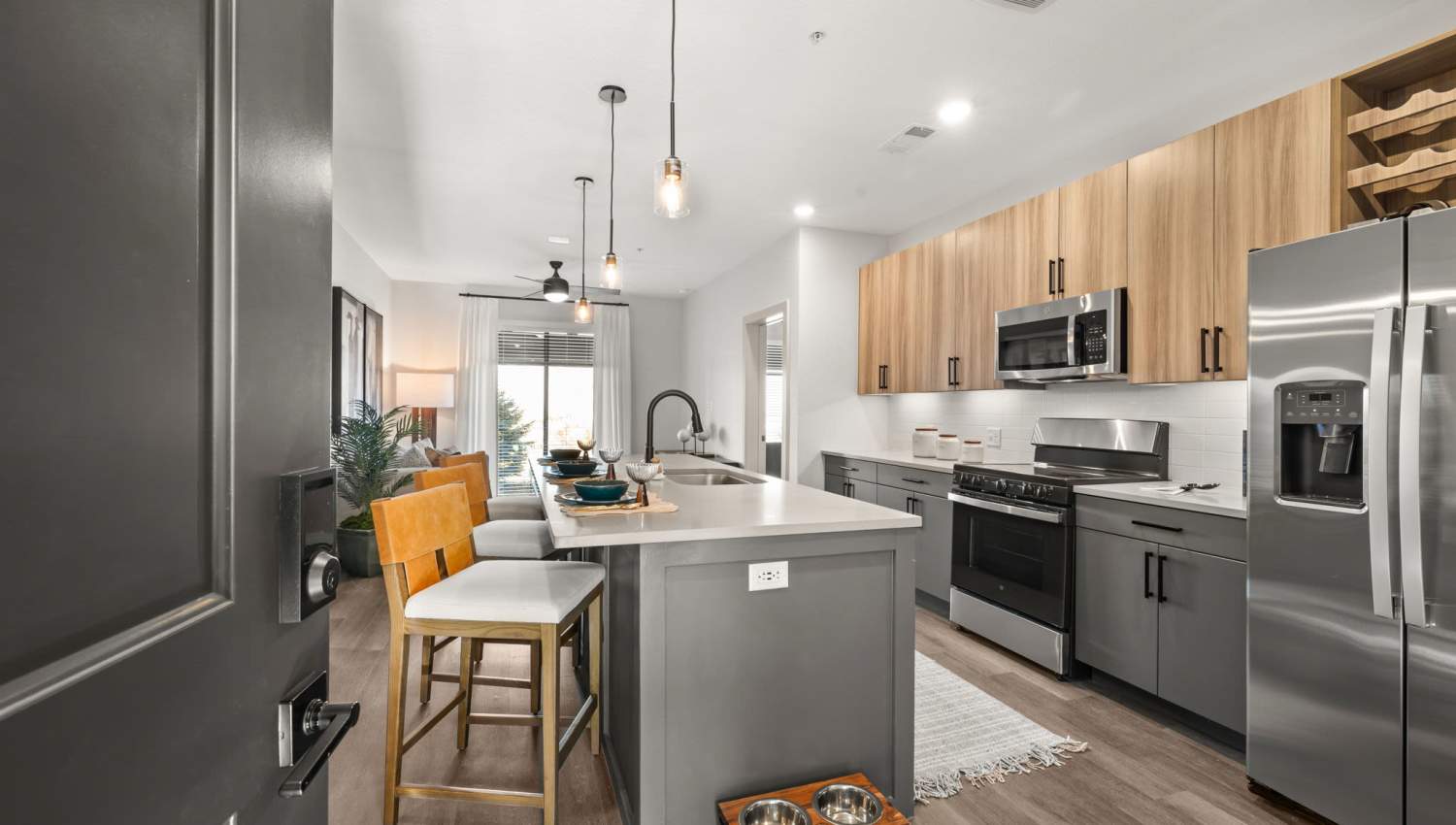 Kitchen with island countertop at The Lock at Flatirons in Broomfield, Colorado