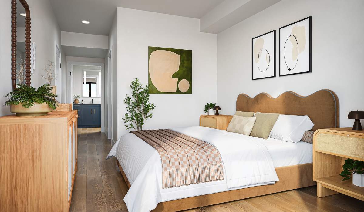 Furnished bedroom with wall decorations at Treehouse in San Diego, California