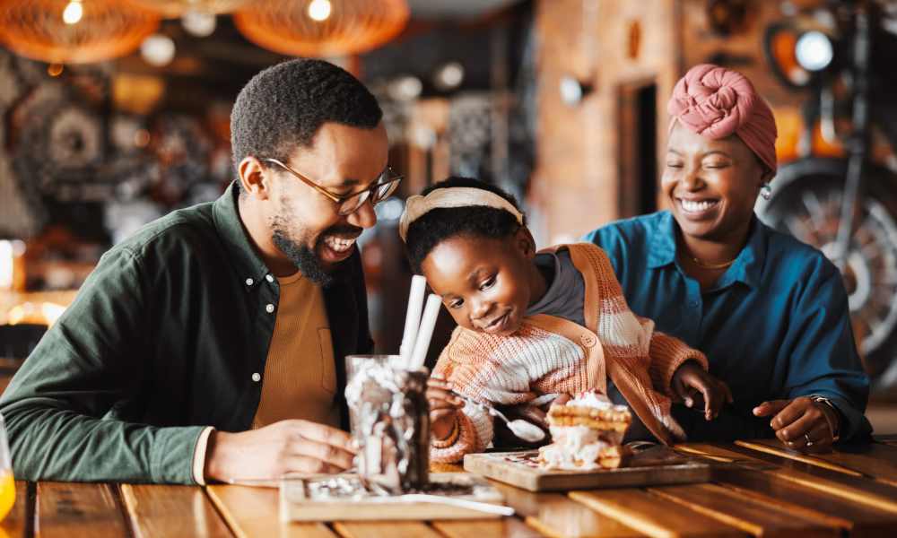 Resident family enjoying in local restaurant near Avonlea Tributary in Lithia Springs, Georgia
