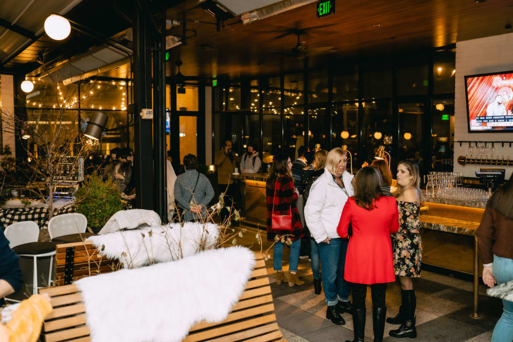 Residents being social at 28 Exeter at Newbury in Boston, Massachusetts