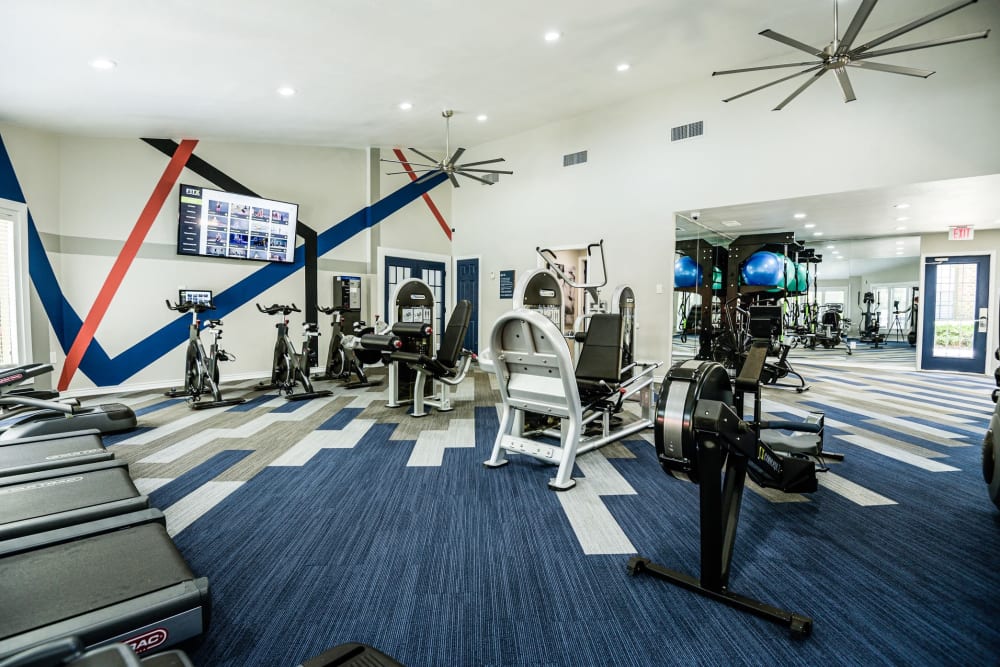 Well equipped fitness center at The Regent in Dallas, Texas