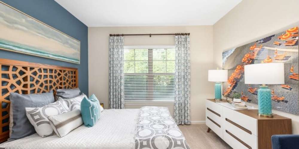 Spacious and well-furnished bedroom at Palmetto Exchange in Ladson, South Carolina