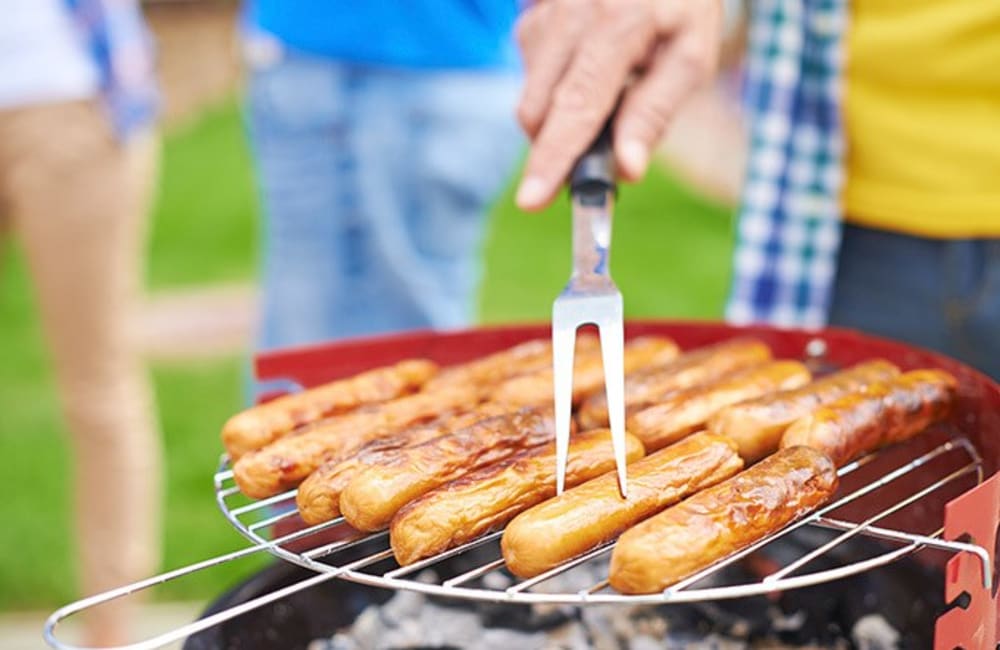 Cooking food on a grill at Gwinnett Station in Tucker, Georgia