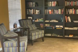 Reading area with lots of books at Serenity Villas in Pomona, California