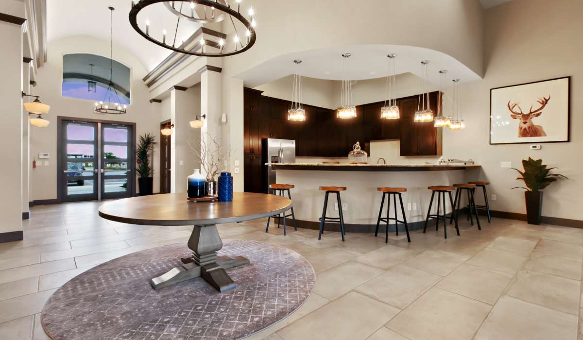 Clubhouse with kitchen and bar stool at Canyon House in New Braunfels, Texas