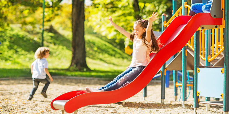 Children playing at a playground near Adobe Flats IV in Twentynine Palms, California