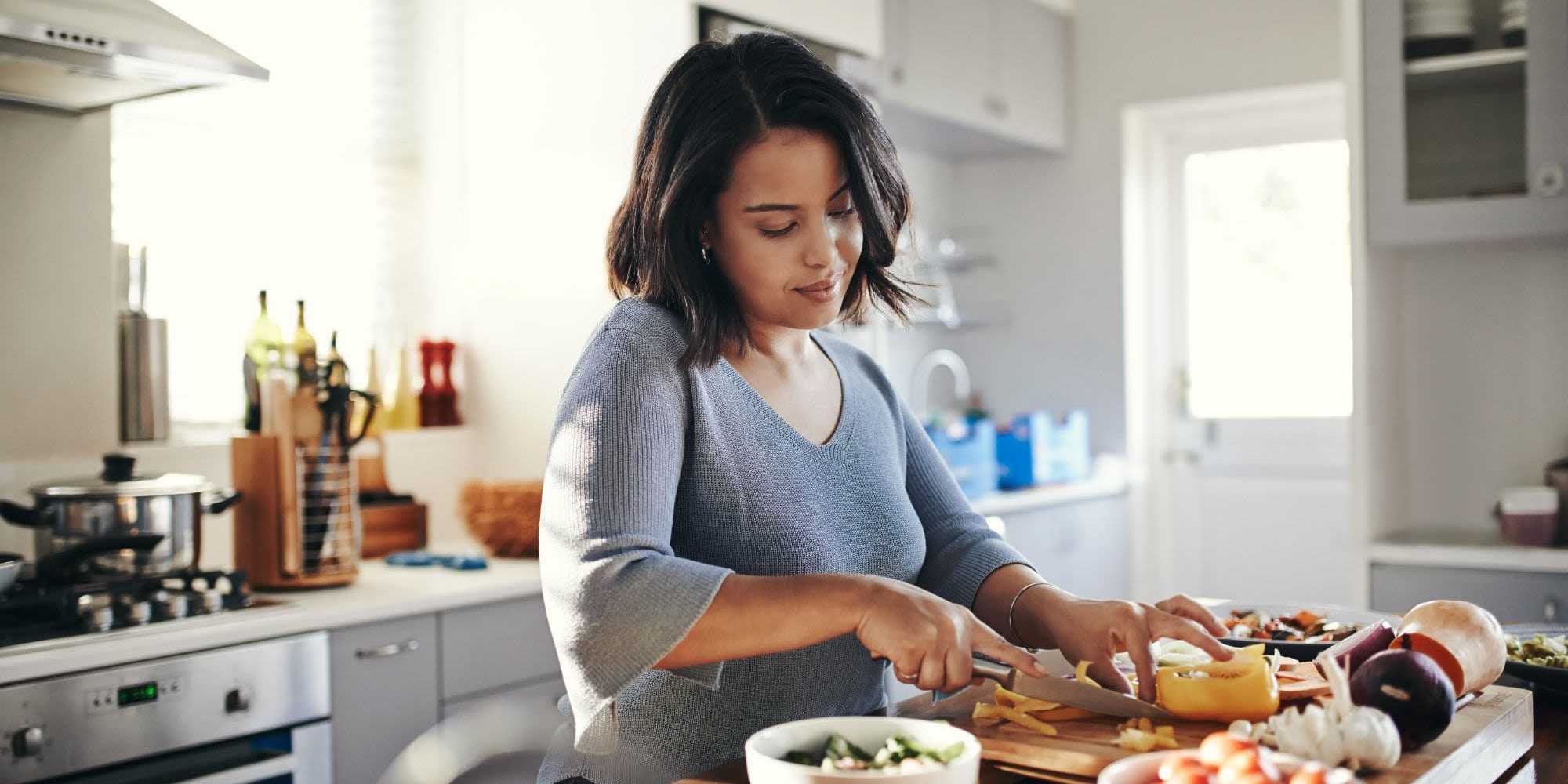 Resident whipping some lunch at her apartment at Indigo in San Antonio, Texas