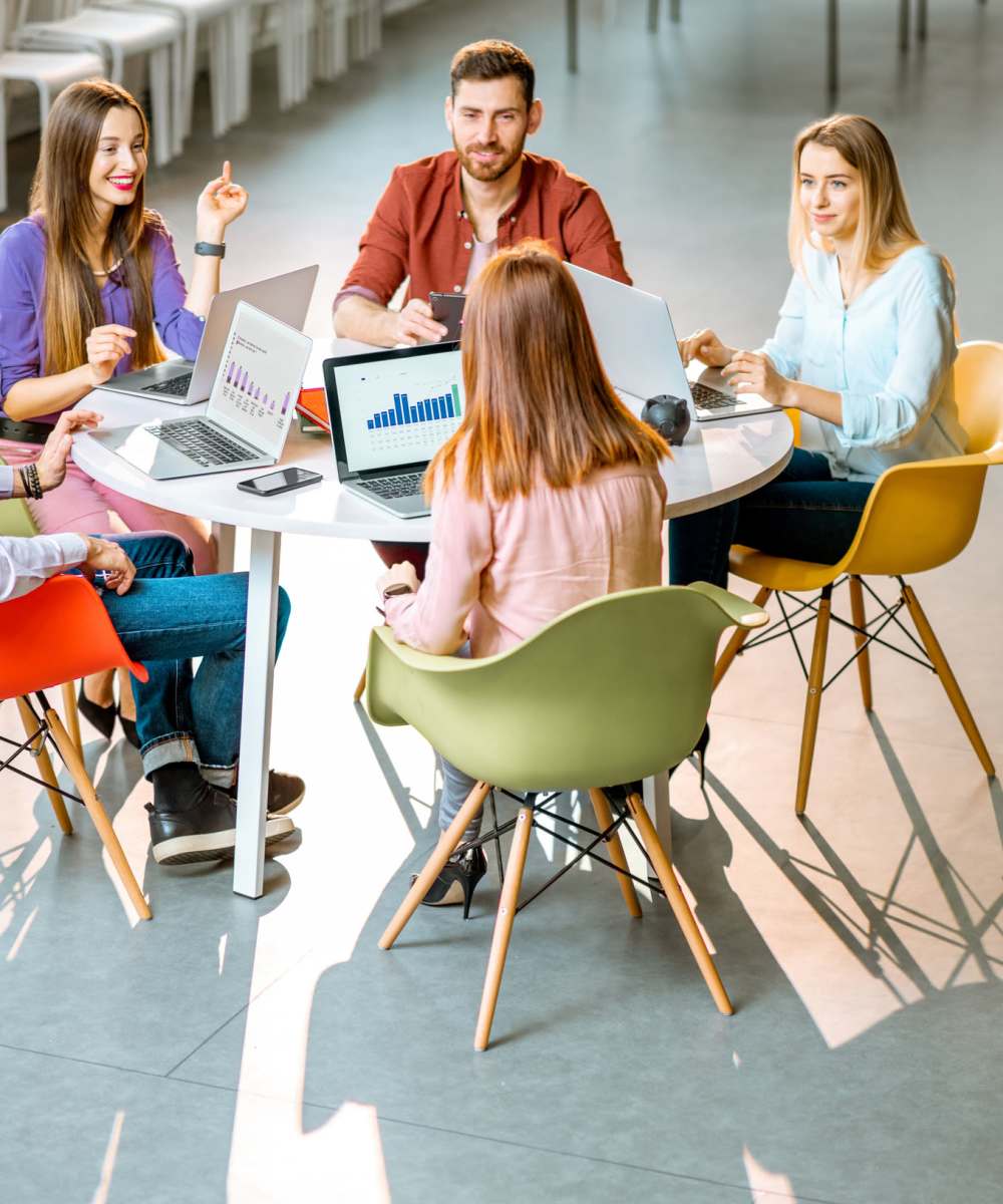  Business people working in conference room at ARTISAN Management Group in Des Moines, Iowa