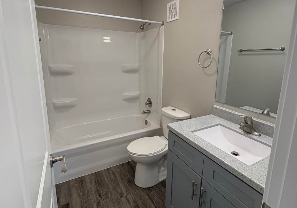 Bathroom with bath-tub at Broadway Crossing Apartments in Merrillville, Indiana