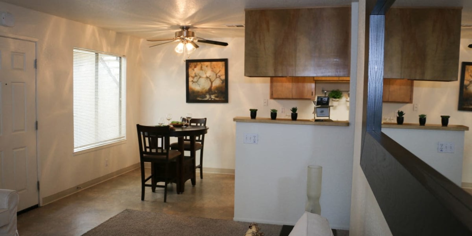 Dining area and kitchen at Oak Park in Turlock, California