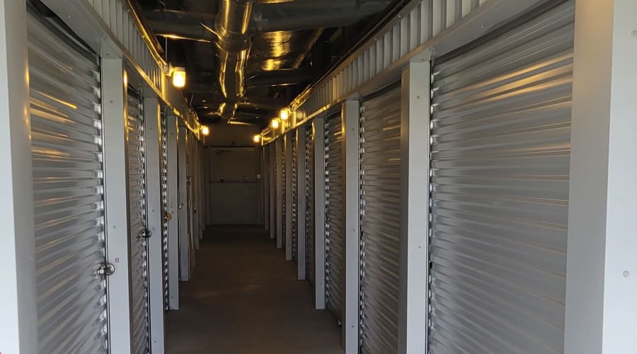 A storage unit filled with boxes at KO Storage in Gilmer, Texas