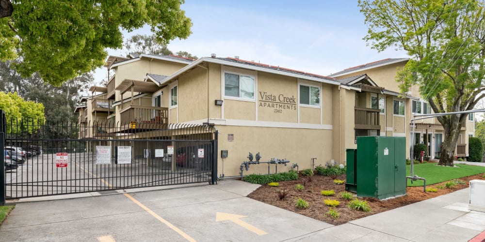 Street view of Vista Creek Apartments with private, gated entrance in Castro Valley, California