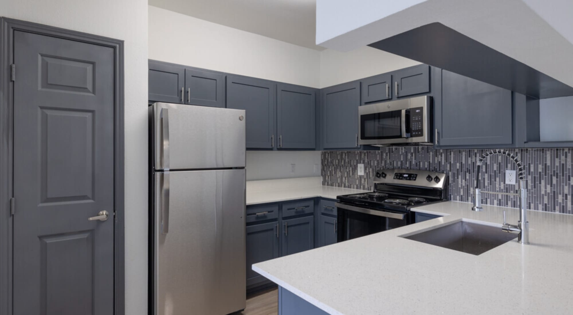 Kitchen area with appliances at Legacy at Cypress in Cypress, Texas