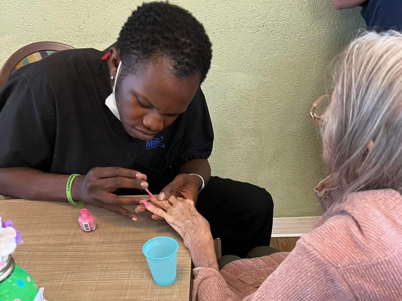 A resident getting her nails done at Carolina Gardens at Conway in Conway, South Carolina