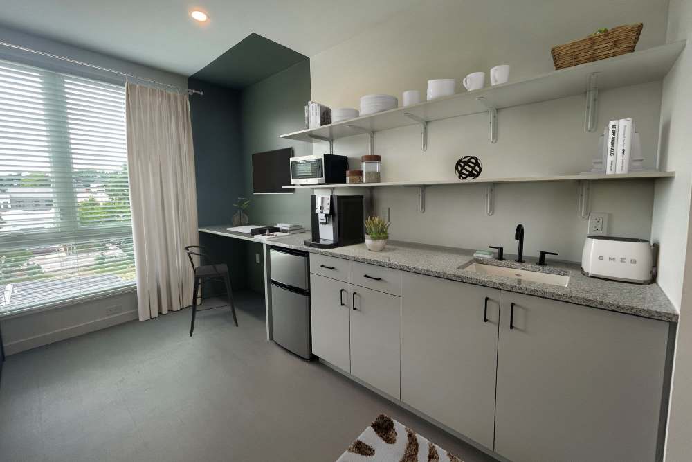 Kitchen with vinyl floor planning at Martin Flats in Nashville, Tennessee