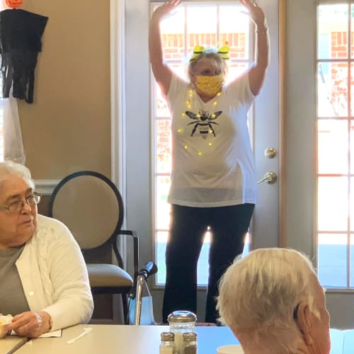 masked caretaker at an event at Canoe Brook Assisted Living in Duncan, Oklahoma