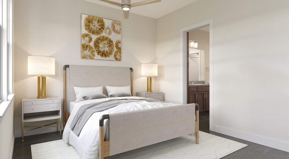 Bedroom with cozy bed at The Cascade at Foundry Creek in Richmond, Virginia