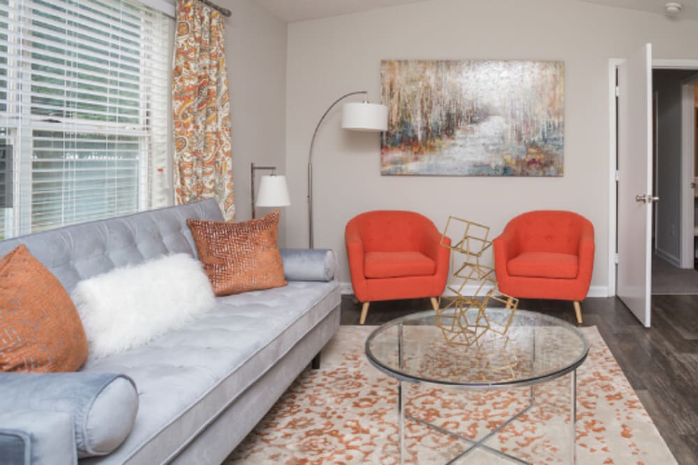 Orange chairs in unit at Elite at City Park in Atlanta, Georgia