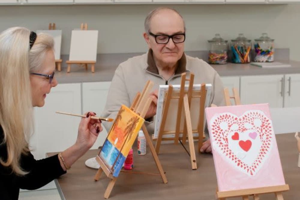 Residents creating a painting at Mercer Hill at Doylestown in Doylestown, Pennsylvania