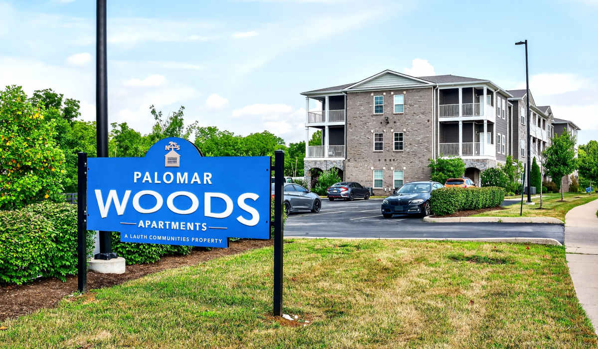 Signage with community view at Palomar Woods in Lexington, Kentucky