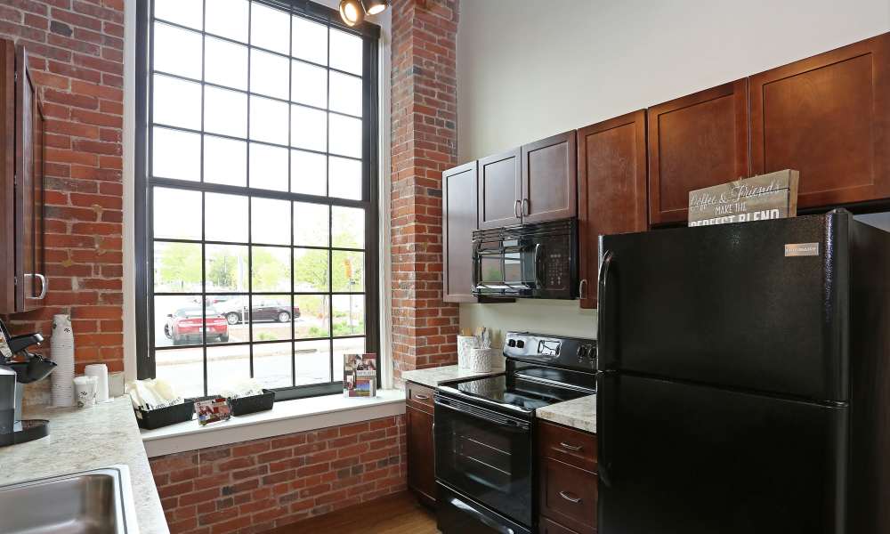 Modern appliances in a model home's kitchen at Capitol Lofts in Hartford, Connecticut