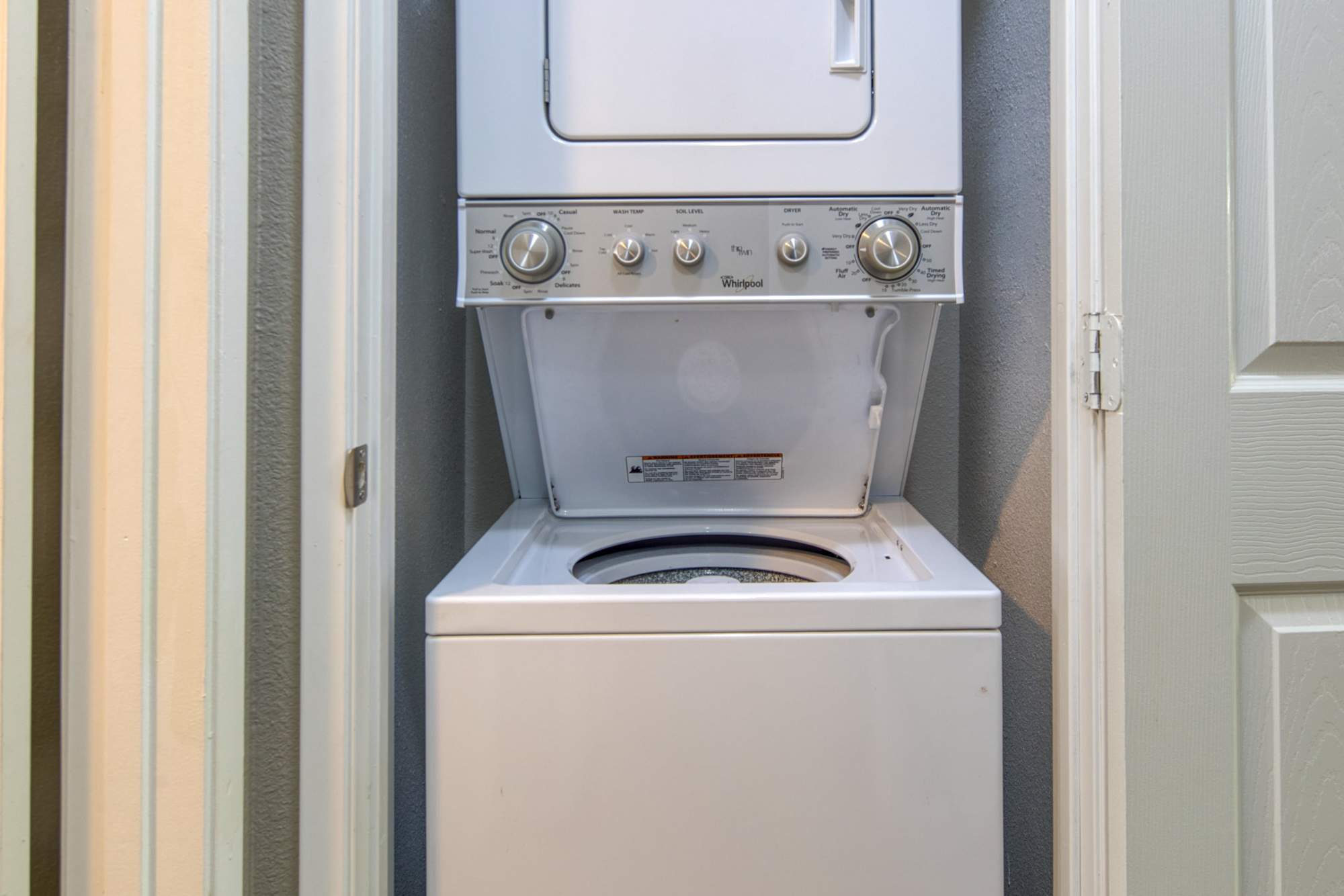 In-home stackable washer and dryer at Falls at Arden in Sacramento, California