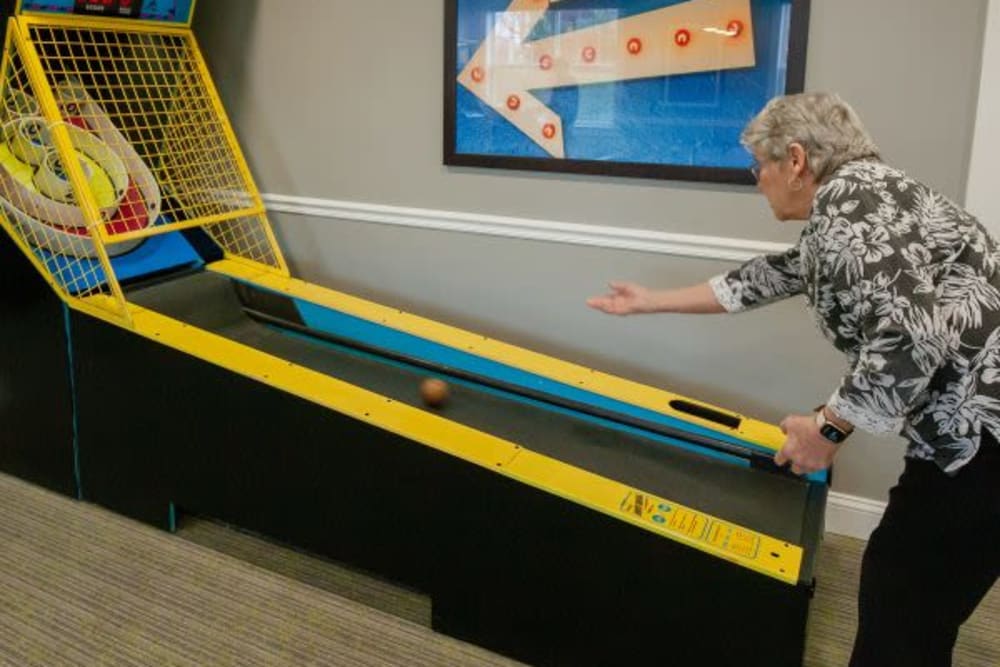 Resident playing a game at The Pinnacle in Plymouth Meeting, Pennsylvania
