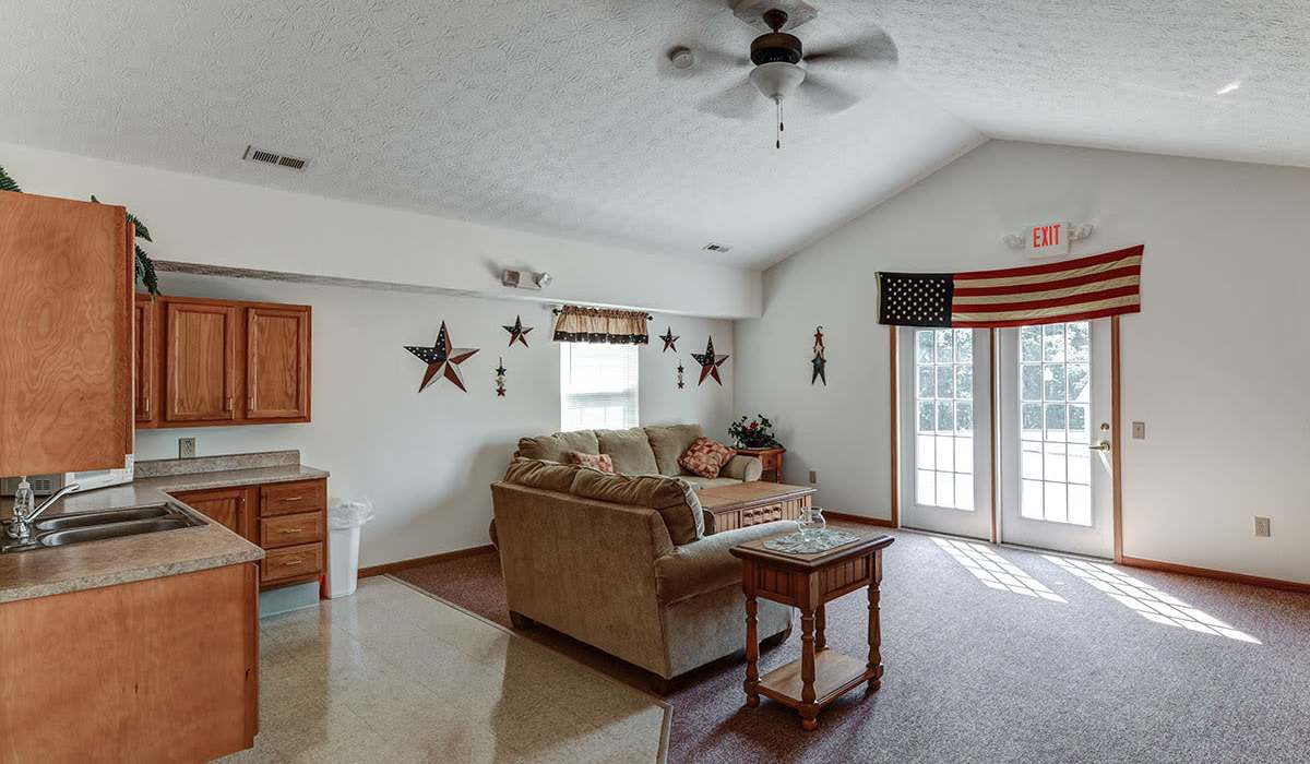 Sofa with decorative pillows and coffee table at Clover Ridge in McConnelsville, Ohio
