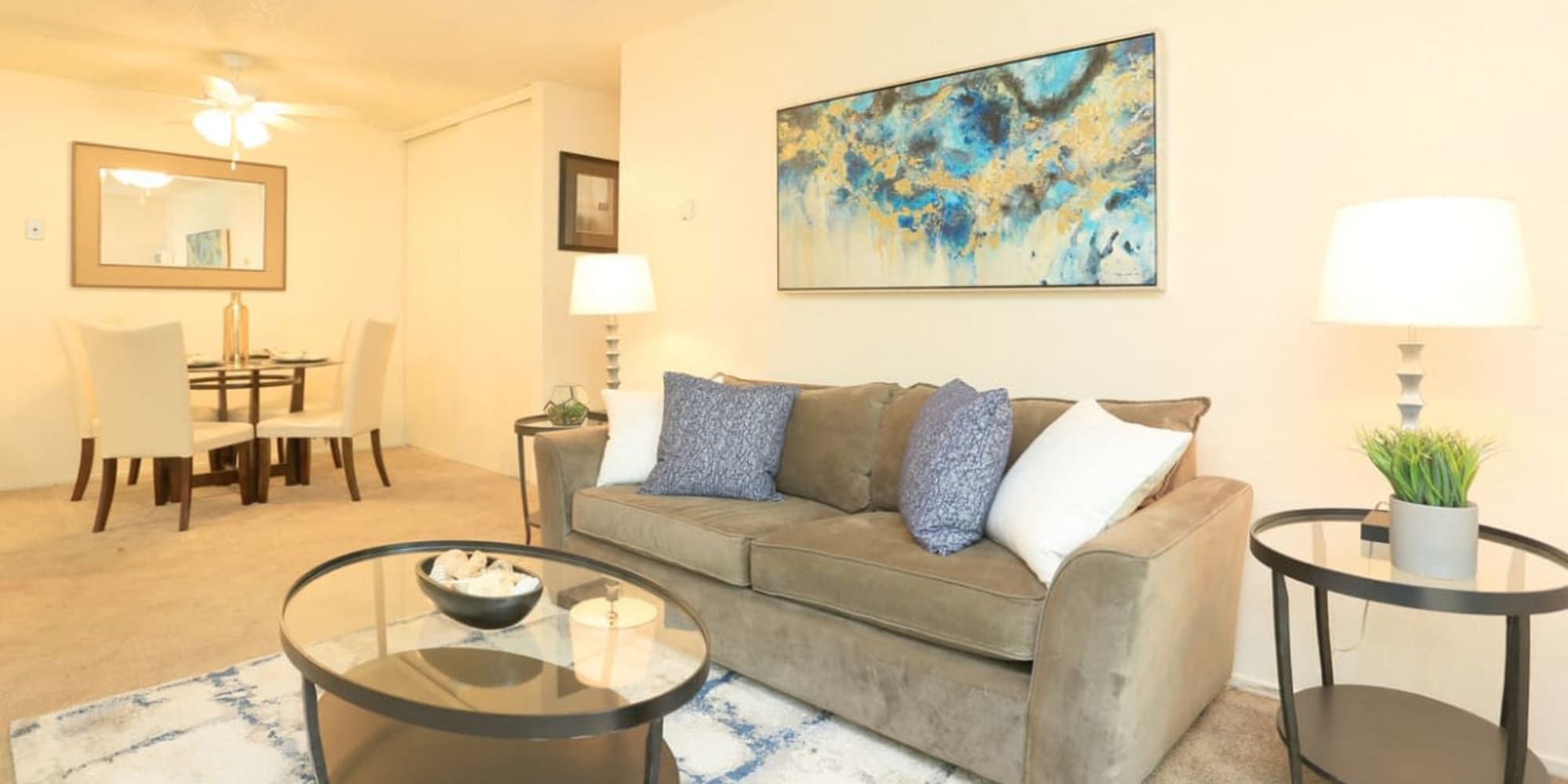 Open concept living area with wall art at Shasta Terrace in Vacaville, California