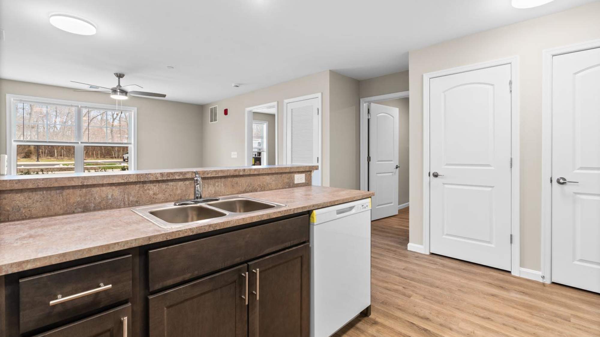 Kitchen leading into living space Millersview Crossing in Millersville, Maryland