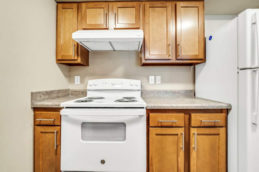 Kitchen with white appliances at Hobbs Greene in Wheeling, West Virginia