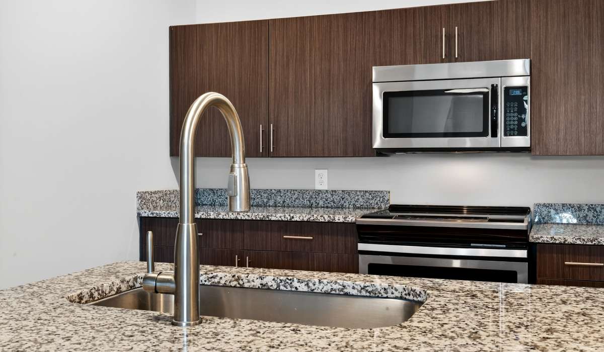 Kitchen with wooden cabinets at Palomar Stables in Lexington,Kentucky