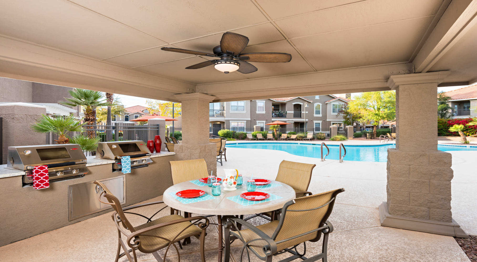 Outdoor BBQ and community space at Villas on Hampton Avenue in Mesa, Arizona