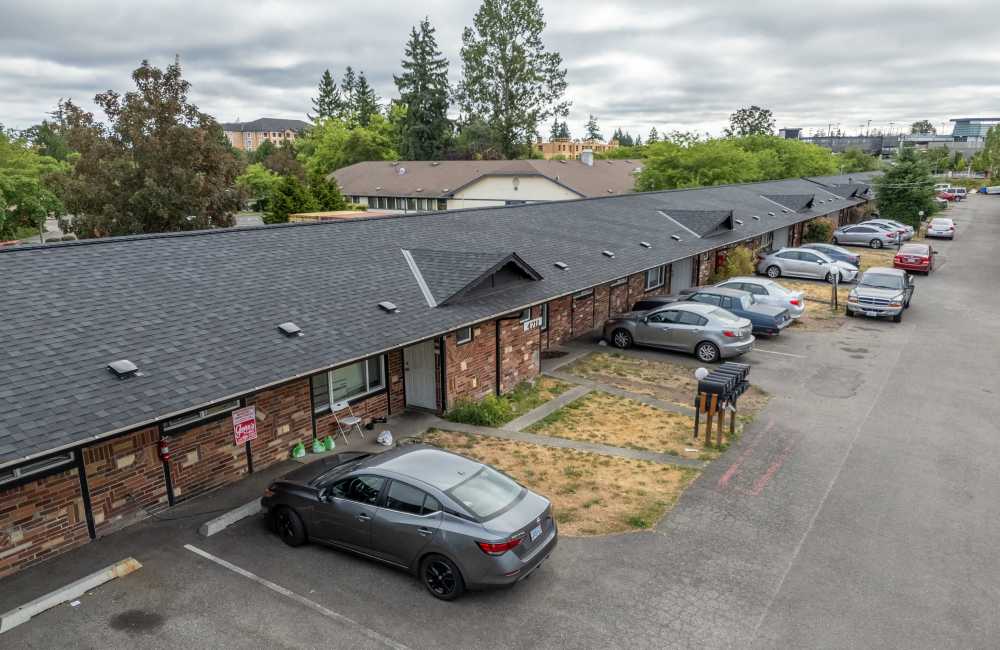 Car parking view in exterior of apartments at The Sage Collection in Tacoma, Washington