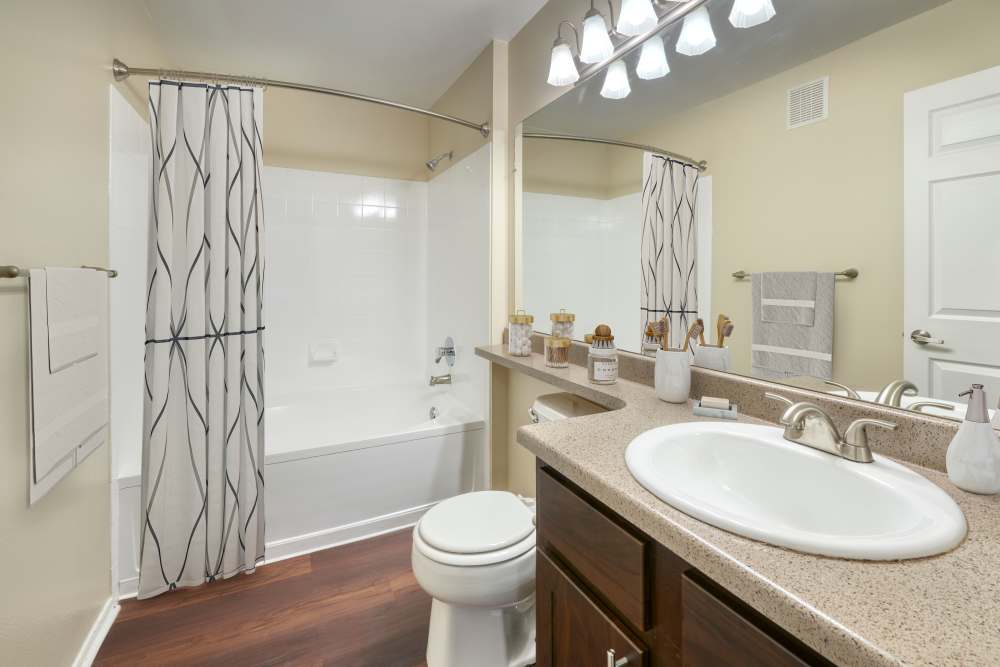 Apartment bathroom at Promenade at Hunter's Glen Apartments in Thornton, Colorado