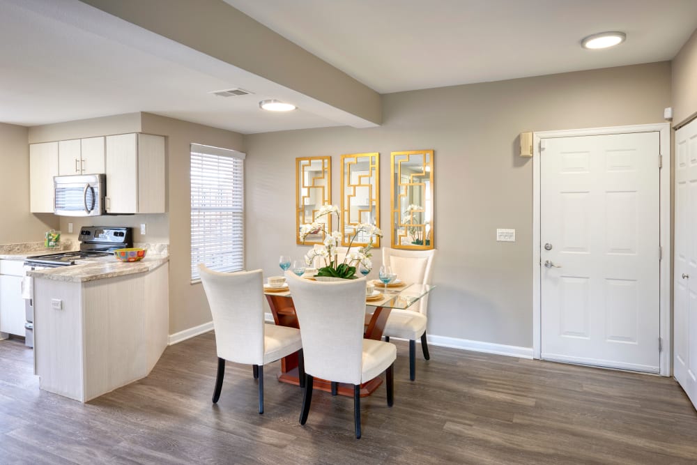 Kitchen with wood-style flooring at Villas at Homestead Apartments in Englewood, Colorado